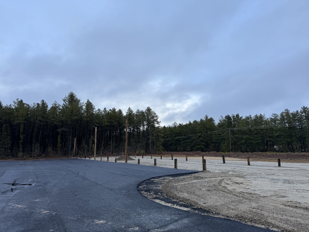 Storage shed and parking area overview
