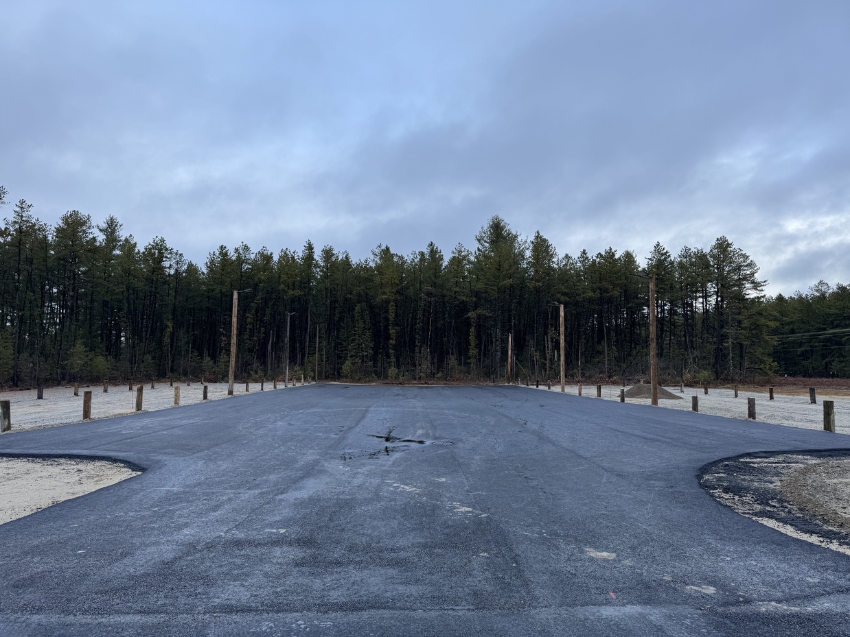 Panoramic view of truck parking lot with marked spaces
